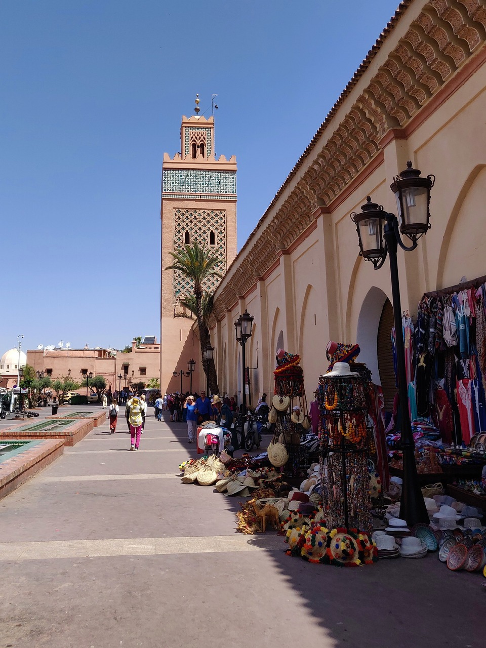 Panoramic view of the journey from Jemaa el-Fna to Ben Youssef, capturing the essence and vibrancy of Marrakech Souks' main thoroughfare